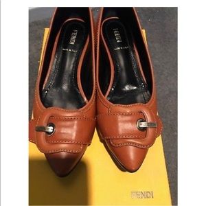Fendi cognac colored buckled flats